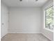 Bright bedroom with a window, plush carpet, and a ceiling fan, offering a serene living space at 206 Five Iron Nw Ct, Kennesaw, GA 30144