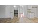 Entryway view looking towards the front door and pantry at 206 Five Iron Nw Ct, Kennesaw, GA 30144