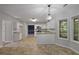 Modern kitchen with white cabinets, granite countertops, and ample natural light at 206 Five Iron Nw Ct, Kennesaw, GA 30144