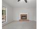 Living room features a fireplace, and access to the outdoor living space at 206 Five Iron Nw Ct, Kennesaw, GA 30144