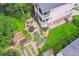 Aerial view of house with stone terracing, lush landscaping, and back patios at 218 South Se Ave, Atlanta, GA 30315