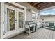 Back deck with outdoor kitchen and seating area at 218 South Se Ave, Atlanta, GA 30315