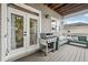 Inviting back porch with an outdoor grill, and a comfortable bench seating area at 218 South Se Ave, Atlanta, GA 30315