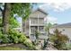 Charming two-story home with a spacious backyard patio and seating at 218 South Se Ave, Atlanta, GA 30315