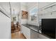 Wet bar features granite counters, wine rack, and stylish accents at 218 South Se Ave, Atlanta, GA 30315