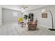 Finished basement with tile floors, a ceiling fan and decorated with modern furniture at 218 South Se Ave, Atlanta, GA 30315