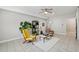 Finished basement with tile floors, a ceiling fan and decorated with modern furniture at 218 South Se Ave, Atlanta, GA 30315