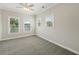 This bedroom features neutral walls, carpet and a ceiling fan at 218 South Se Ave, Atlanta, GA 30315