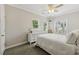 Cozy bedroom with a ceiling fan, neutral walls, and natural light from the windows at 218 South Se Ave, Atlanta, GA 30315