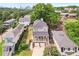 Two-story home with a charming front porch, two car garage and manicured landscaping at 218 South Se Ave, Atlanta, GA 30315