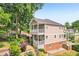 Two-story home with charming dual back porches and landscaped yard at 218 South Se Ave, Atlanta, GA 30315