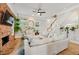 Bright living room with hardwood floors, a fireplace, and cozy seating area at 218 South Se Ave, Atlanta, GA 30315