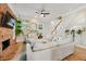 Comfortable living room with brick fireplace and stylish stairway at 218 South Se Ave, Atlanta, GA 30315