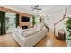 Inviting living room features exposed brick fireplace, wood floors, and natural light at 218 South Se Ave, Atlanta, GA 30315