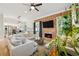Open living area with fireplace, seamlessly connected to the modern kitchen at 218 South Se Ave, Atlanta, GA 30315