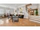 Open-concept living area flows into the dining room and features hardwood floors at 218 South Se Ave, Atlanta, GA 30315
