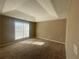 Bright bedroom with carpeted floors and decorative trey ceiling at 3116 Leyland Ct, Decatur, GA 30034