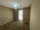 Neutral bedroom with carpeted floors and single window at 3116 Leyland Ct, Decatur, GA 30034