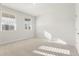 Serene bedroom featuring plush carpeting and two windows providing natural light at 4036 Trimrose Ct, Atlanta, GA 30349