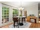 Bright breakfast nook with natural light, a small round table, and access to the outdoor deck at 4246 N Mountain Ne Rd, Marietta, GA 30066