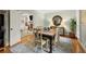 Inviting dining room featuring classic decor and an open view into the living room at 4246 N Mountain Ne Rd, Marietta, GA 30066