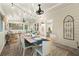 Elegant sunroom features a dining area, comfortable seating, and stylish decor at 4246 N Mountain Ne Rd, Marietta, GA 30066