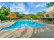 Community pool with ample seating and a sundeck offers a relaxing experience at 4246 N Mountain Ne Rd, Marietta, GA 30066