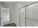 Bathroom with glass shower door at 436 Corricella Ct, Mcdonough, GA 30253