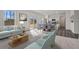Spacious living room with modern sofa and large windows at 436 Corricella Ct, Mcdonough, GA 30253