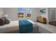 Bright main bedroom featuring plush carpet, natural light, and ensuite bathroom at 436 Corricella Ct, Mcdonough, GA 30253