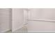 Upstairs hallway with carpet and open closet at 11408 Gray Branch Dr, Lawrenceville, GA 30045