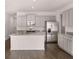 Modern kitchen featuring stainless steel appliances, granite countertops, and large island at 11408 Gray Branch Dr, Lawrenceville, GA 30045