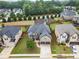 An aerial view showing a charming home nestled between neighboring houses with a playground in the community at 212 Jetta Cir, Mcdonough, GA 30253