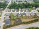 Aerial view displays a home in a Gathering-friendly neighborhood with community playground at 212 Jetta Cir, Mcdonough, GA 30253