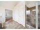 Modern bathroom features a glass-enclosed shower and tile flooring for a luxurious feel at 212 Jetta Cir, Mcdonough, GA 30253