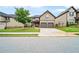 Charming two-story home featuring a manicured lawn, a two-car garage, and a welcoming entrance at 212 Jetta Cir, Mcdonough, GA 30253