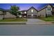 Charming two-story home featuring a manicured lawn, a two-car garage, and a welcoming entrance at 212 Jetta Cir, Mcdonough, GA 30253