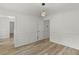 Bright dining room with hardwood flooring, neutral paint and white trim at 4220 Singing Post Ne Ln, Roswell, GA 30075
