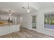 Bright kitchen features white cabinets, butcher block countertops and a view of the backyard at 4220 Singing Post Ne Ln, Roswell, GA 30075