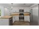 Modern kitchen featuring stainless steel appliances and lots of white cabinets for plenty of storage at 4220 Singing Post Ne Ln, Roswell, GA 30075