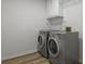 Well-equipped laundry room with modern washer and dryer units at 4220 Singing Post Ne Ln, Roswell, GA 30075