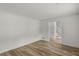 Bright living room with hardwood flooring, neutral paint and white trim at 4220 Singing Post Ne Ln, Roswell, GA 30075