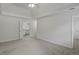Bright main bedroom leading to the main bathroom and closet at 4220 Singing Post Ne Ln, Roswell, GA 30075