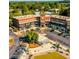 An aerial view showcases the commercial space with ample parking and convenient access to all shops at 6450 Pond View Dr, Cumming, GA 30028