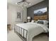 Stylishly decorated bedroom with a statement wall and decorative lighting fixture at 6450 Pond View Dr, Cumming, GA 30028