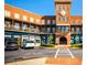 Upscale condo building exterior with brick facade, private terraces, and convenient parking at 6450 Pond View Dr, Cumming, GA 30028