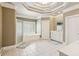 Bathroom with a glass shower, soaking tub, and a double sink vanity with white cabinets at 952 Moores Walk Ln, Suwanee, GA 30024