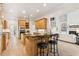 Gourmet kitchen with granite countertops, stainless steel appliances, and an island with barstool seating at 952 Moores Walk Ln, Suwanee, GA 30024