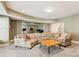 Spacious living room featuring a large sectional sofa and a stylish coffee table at 952 Moores Walk Ln, Suwanee, GA 30024