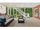 Covered patio with outdoor furniture, and access to an outdoor staircase at 952 Moores Walk Ln, Suwanee, GA 30024